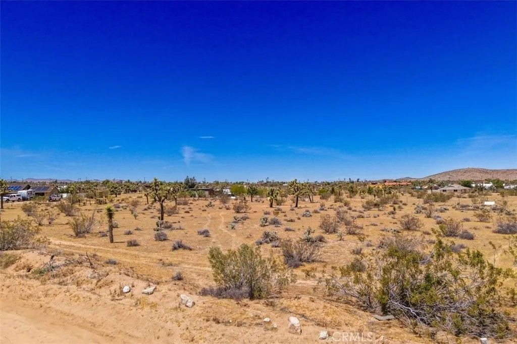 Photo of 59688 Drexel Rd, Yucca Valley, CA 92284 (MLS # JT26088999)