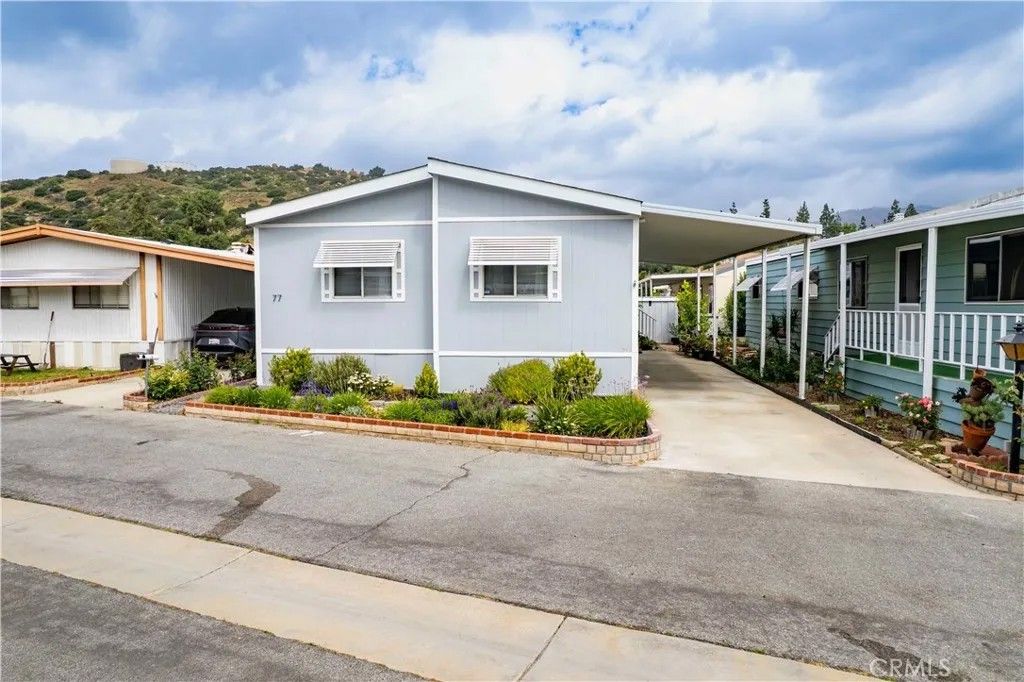 Photo of 11401 Topanga Canyon #77, Chatsworth, CA 91311 (MLS # SR26075333)