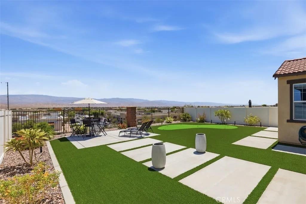 Photo of 41378 Harvey Mudd Dr, Palm Desert, CA 92211 (MLS # IG26127716)