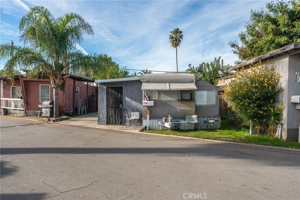Photo of 775 E Foothill Blvd #14, Rialto, CA 92376 (MLS # CV25281651)