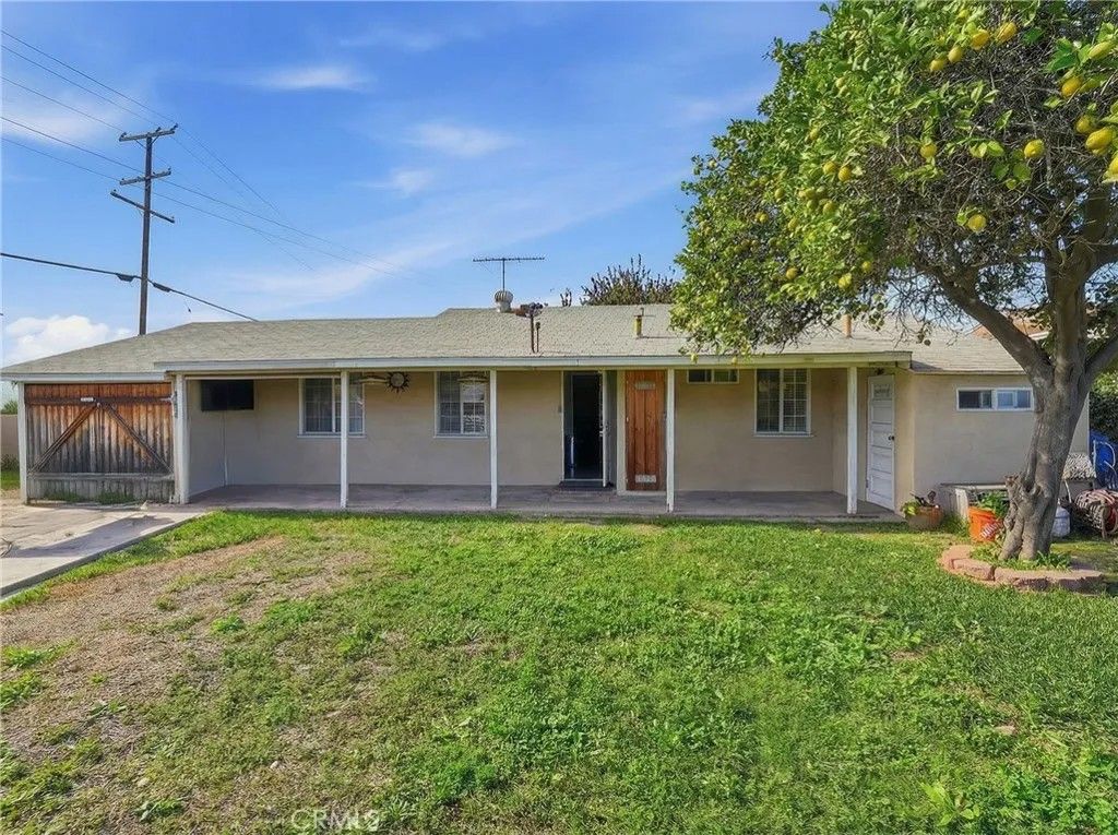 Photo of 12830 Dunrobin Ave, Downey, CA 90242 (MLS # DW26007343)