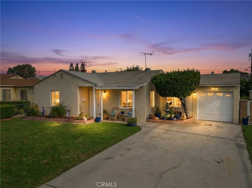 Photo of 12830 Dunrobin Ave, Downey, CA 90242 (MLS # DW26007343)