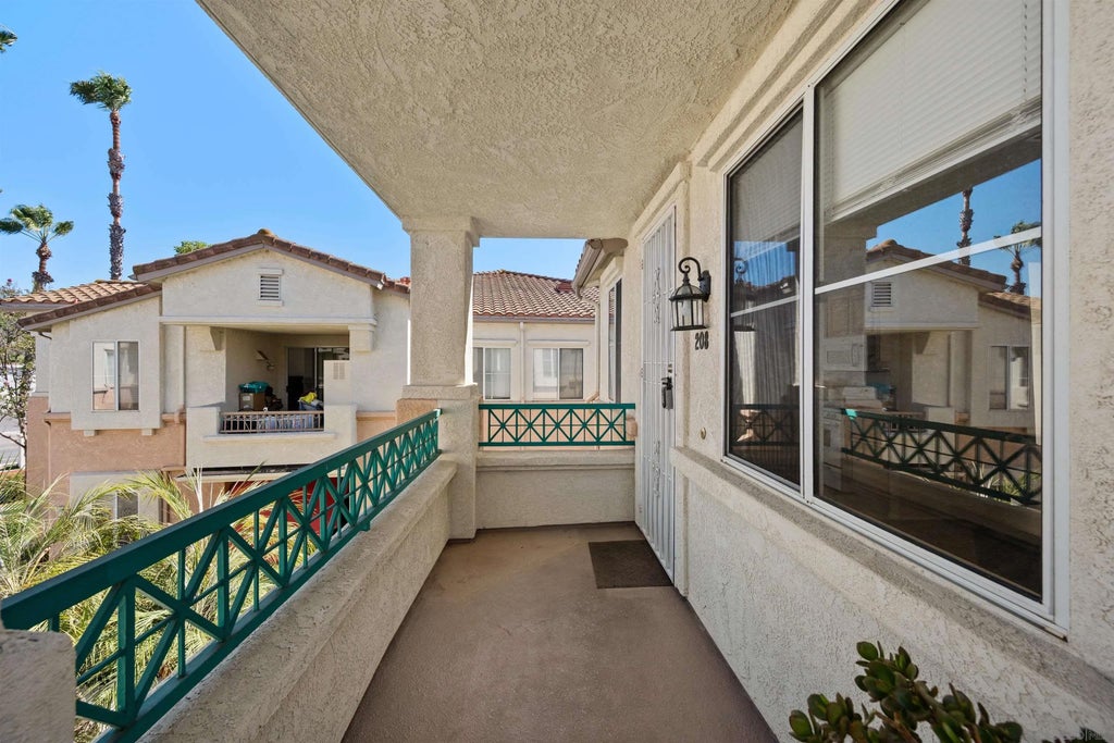 Photo of 11454 Via Rancho San Diego #208, El Cajon, CA 92019 (MLS # 260016557)