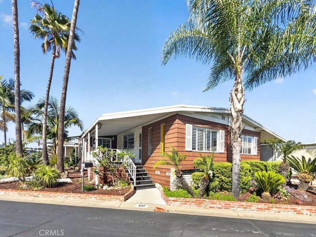 Photo of 24921 Muirlands Blvd #297, Lake Forest, CA 92630 (MLS # OC26091355)