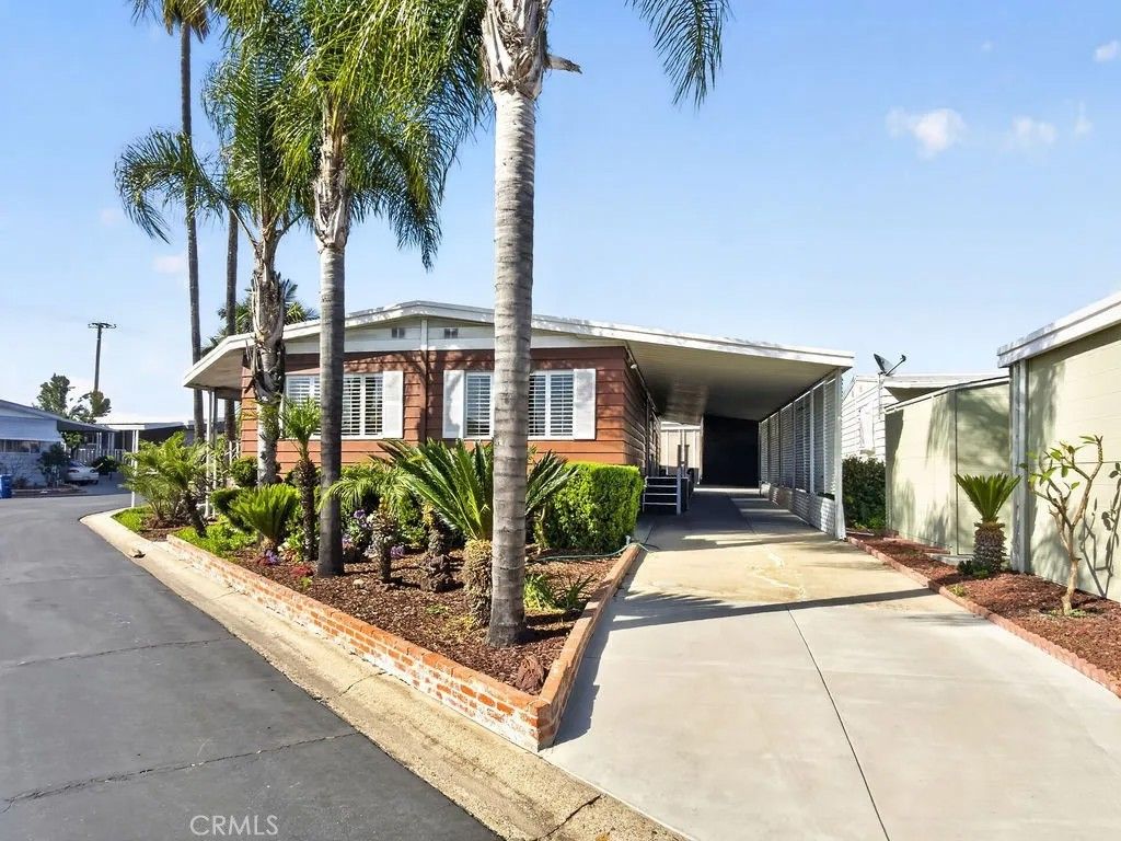 Photo of 24921 Muirlands Blvd #297, Lake Forest, CA 92630 (MLS # OC26091355)