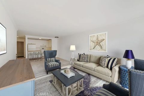 Photo of 300 Cagney Ln #208, Newport Beach, CA 92663 (MLS # NP26028611)