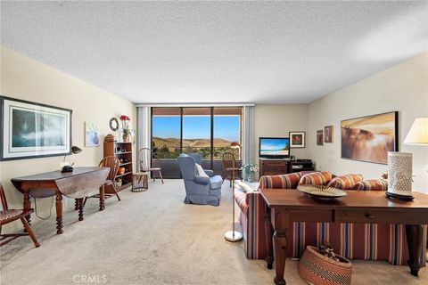 Photo of 24055 Paseo Del Lago #407, Laguna Woods, CA 92637 (MLS # OC26077170)