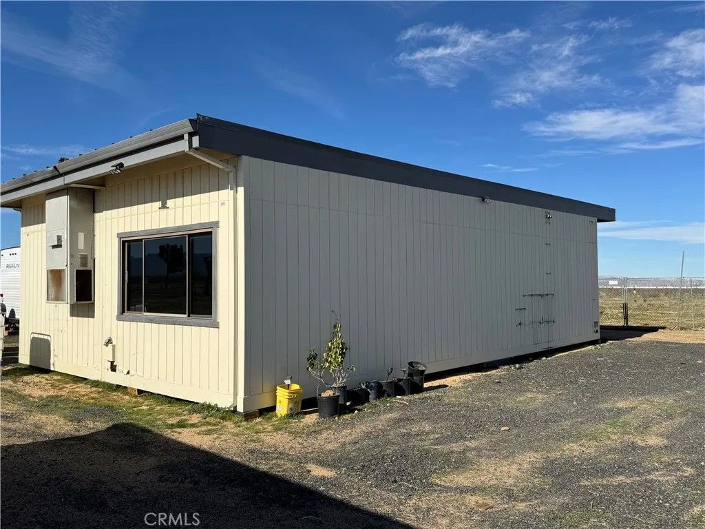 Photo of 10620 Mojave Dr, Adelanto, CA 92301 (MLS # TR25278757)