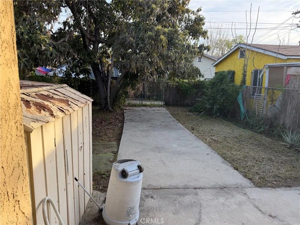 Photo of 350 W 59th Pl, Los Angeles, CA 90003 (MLS # SB26043163)