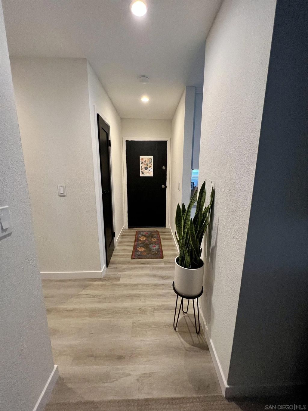 Photo of 5462 Adobe Falls Rd #11, San Diego, CA 92120 (MLS # 260006366)