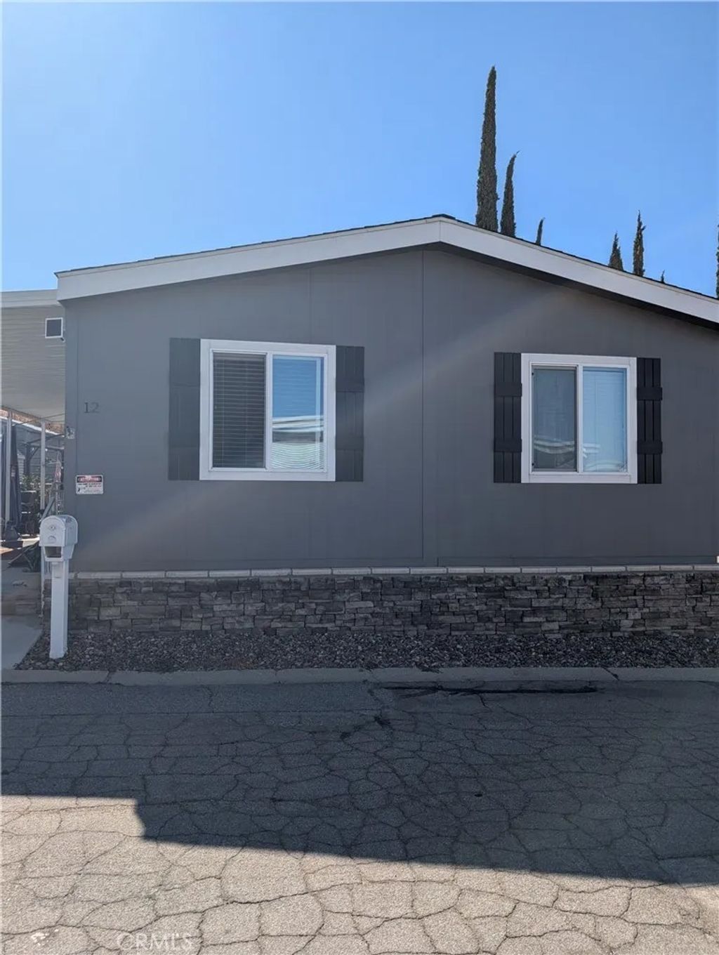 Photo of 10320 Calimesa Blvd #12, Calimesa, CA 92320 (MLS # IG25267297)