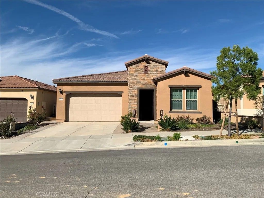 Photo of 24231 Evesong Drive, Corona, CA 92880 (MLS # IG26044794)