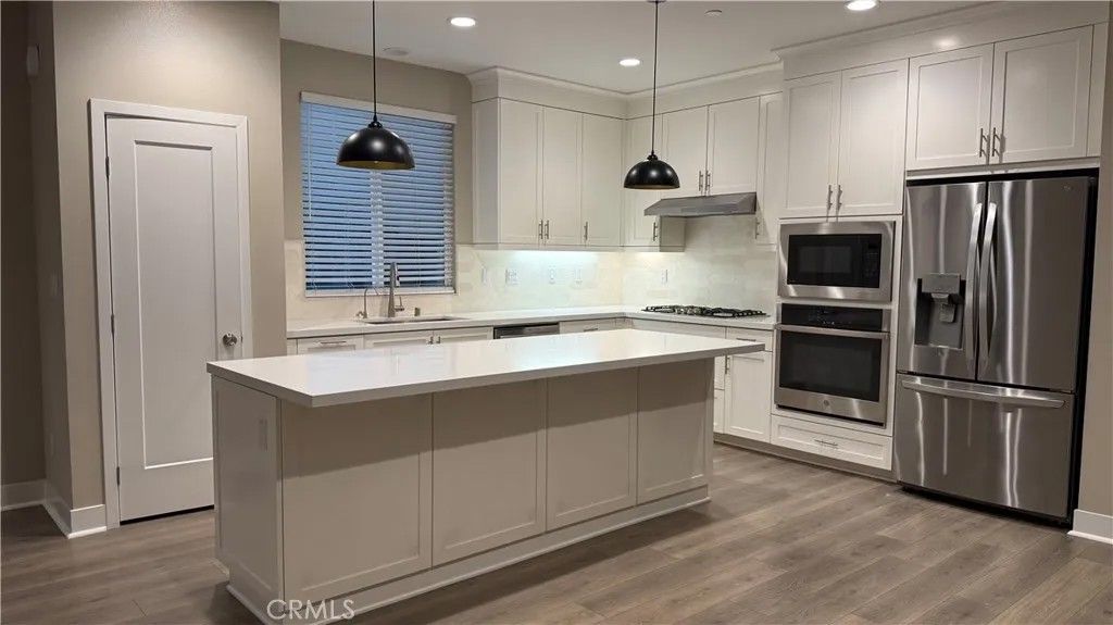 Photo of 165 Tenor, Irvine, CA 92618 (MLS # OC26038882)