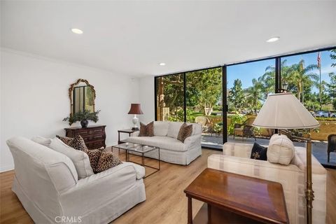 Photo of 24055 Paseo Del Lago #152, Laguna Woods, CA 92637 (MLS # OC26034153)