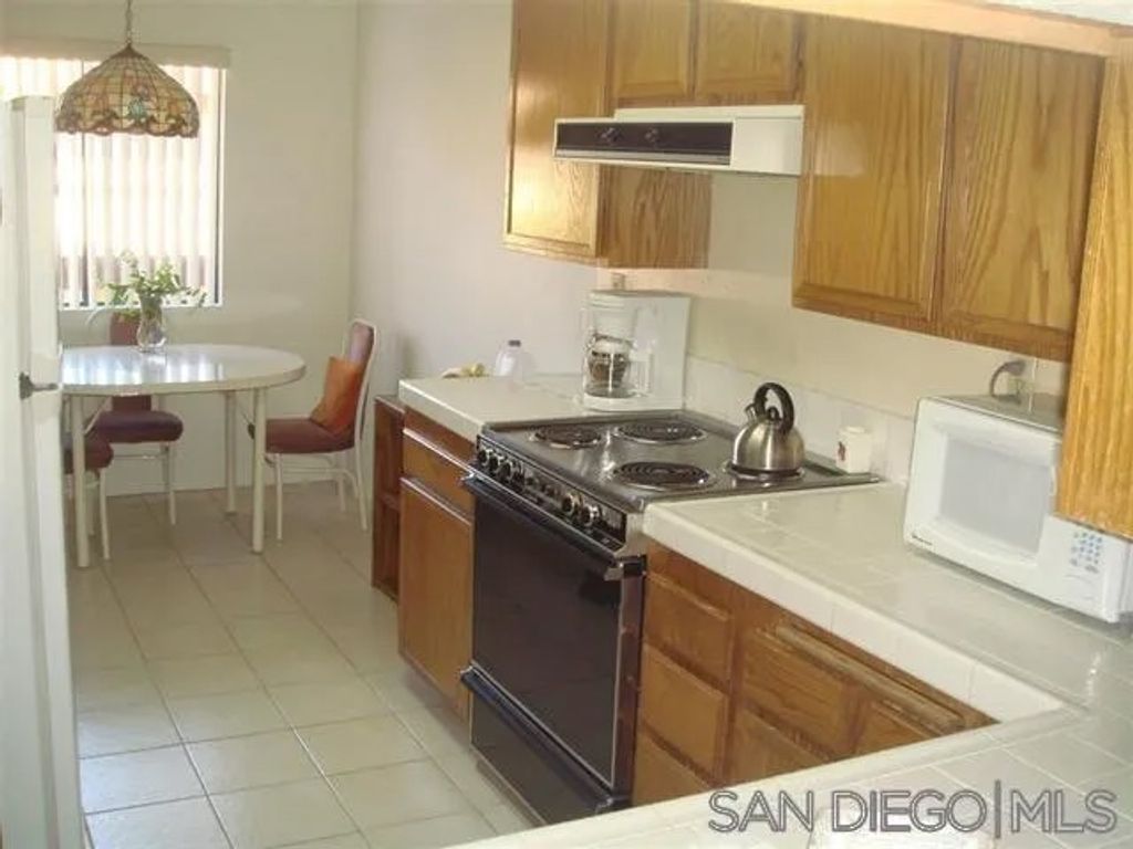 Photo of 6960 Golfcrest Dr #B330, San Diego, CA 92119 (MLS # 260005868)