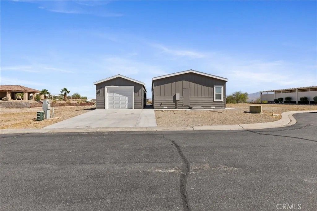 Photo of 12600 Havasu Lake Road #74, Needles, CA 92363 (MLS # SW26072907)
