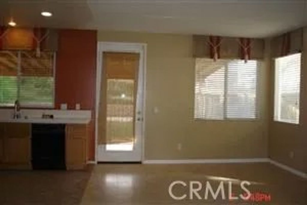 Photo of 33157 Leeward Way, Lake Elsinore, CA 92530 (MLS # OC26025675)