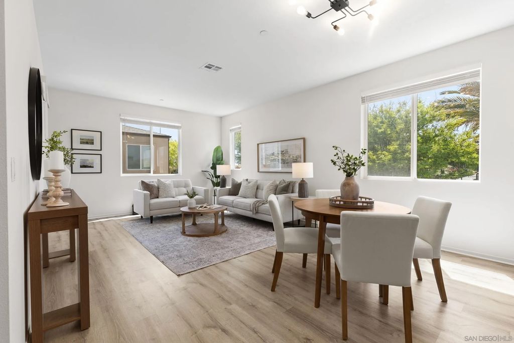 Photo of 5222 Surfwalk Way #6, San Diego, CA 92154 (MLS # 260008472)