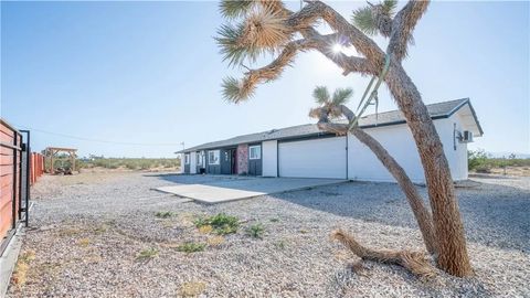 Photo of 670 Ducor Avenue, Landers, CA 92285 (MLS # JT25281289)