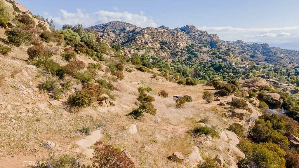 Photo of 9261 Rocky Mesa, West Hills, CA 91304 (MLS # SR26203980)