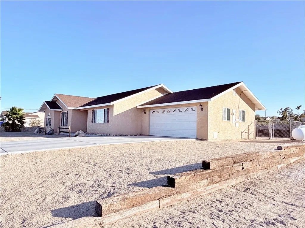 Photo of 74541 Sunrise Drive, 29 Palms, CA 92277 (MLS # JT25271538)