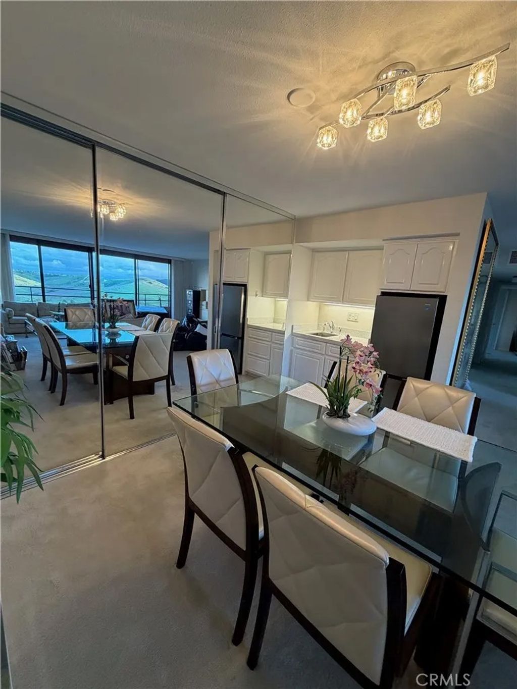 Photo of 24055 Paseo Del Lago #1303, Laguna Woods, CA 92637 (MLS # OC26017659)