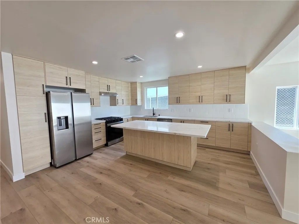 Photo of 17103 Kingsbury St, Granada Hills, CA 91344 (MLS # SR26079400)