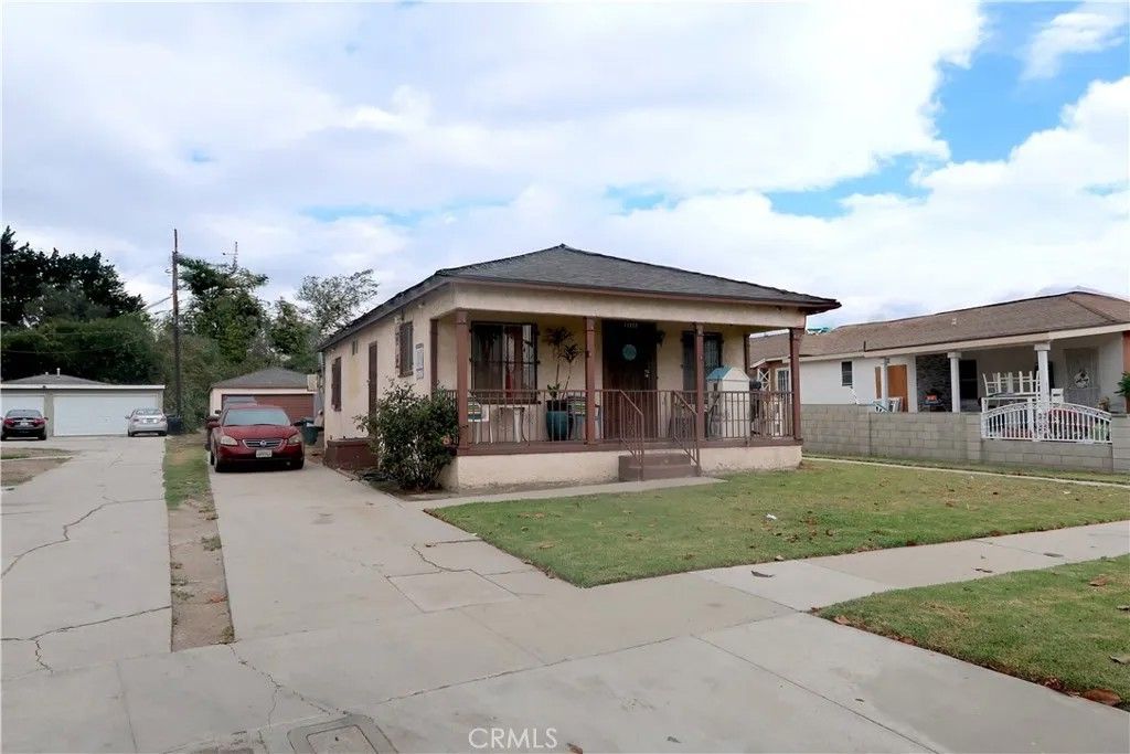 Photo of 11912 Elva Avenue, Los Angeles, CA 90059 (MLS # DW26009853)