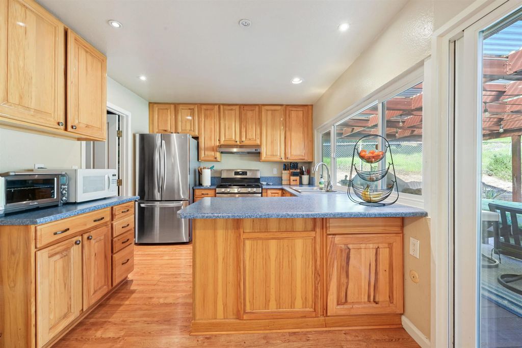 Photo of 9916 Cardoza Dr, Santee, CA 92071 (MLS # 260002653)