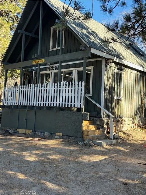 Photo of 2667 Hunsaker Dr, Running Springs, CA 92382 (MLS # IG25274129)