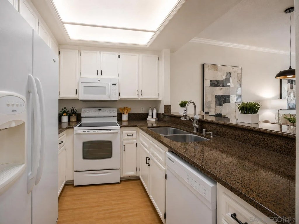 Photo of 2224 River Run Dr #144, San Diego, CA 92108 (MLS # 260014158)