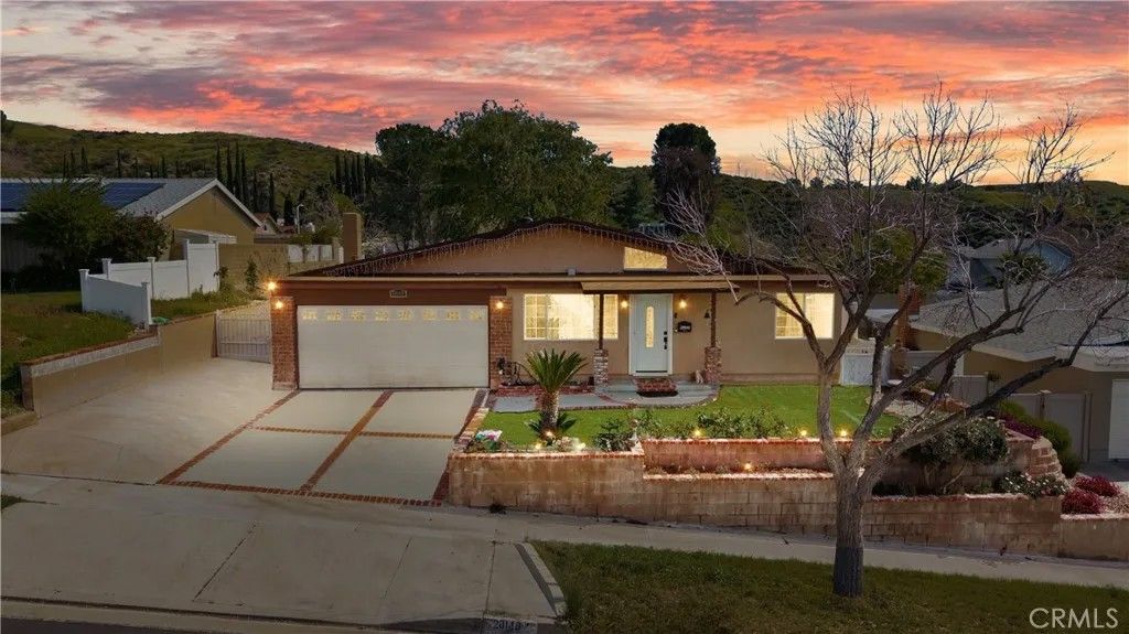 Photo of 28140 Tambora Drive, Canyon Country, CA 91351 (MLS # DW26032511)