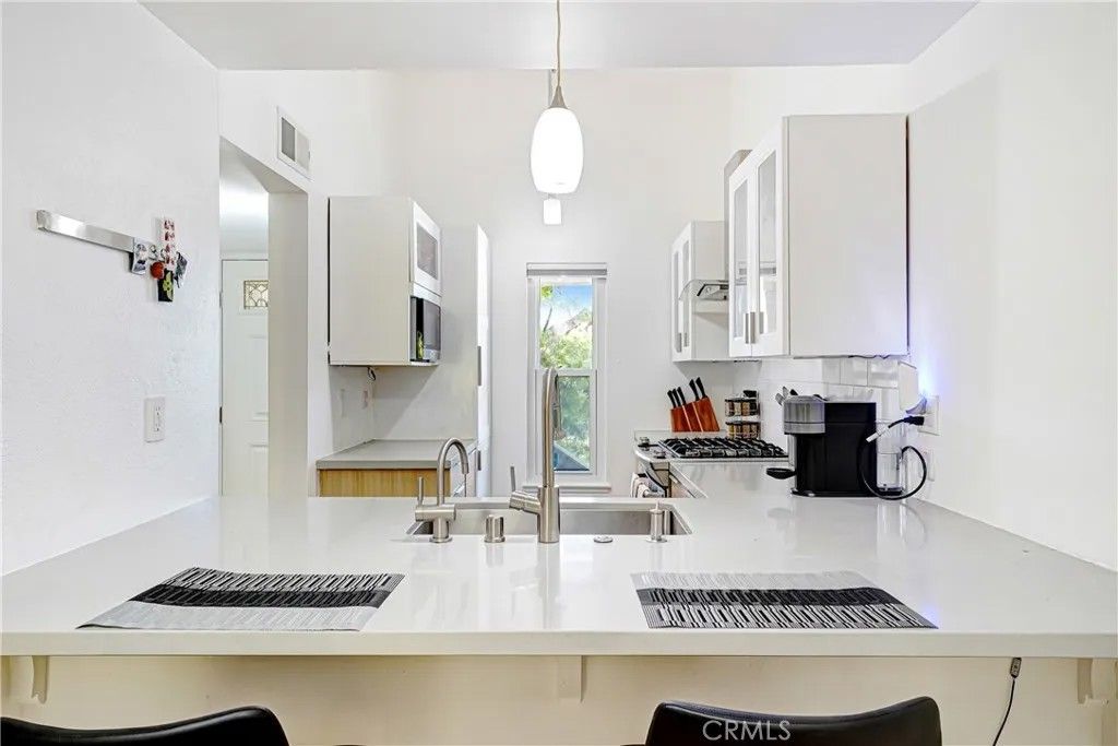 Photo of 7050 Shoup Avenue, Canoga Park, CA 91303 (MLS # SR26059532)