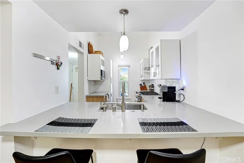 Photo of 7050 Shoup Avenue, Canoga Park, CA 91303 (MLS # SR26059532)