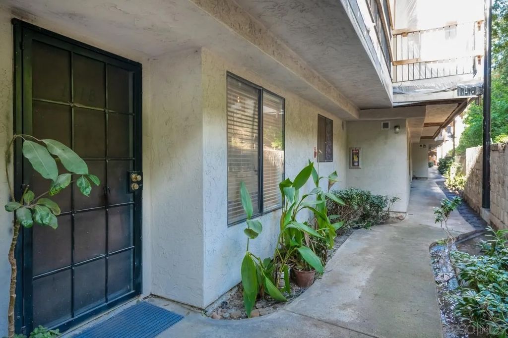 Photo of 6725 Mission Gorge Rd #101B, San Diego, CA 92120 (MLS # 260004621)
