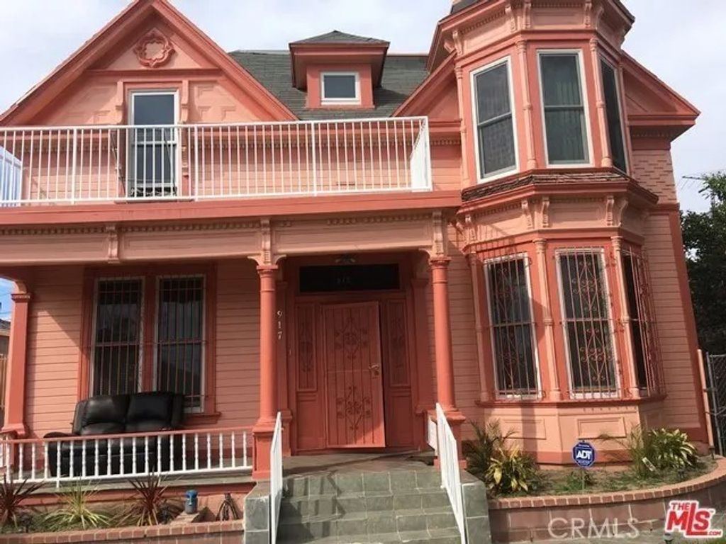 Photo of 917 E 49th Place, Los Angeles, CA 90011 (MLS # OC25249429)