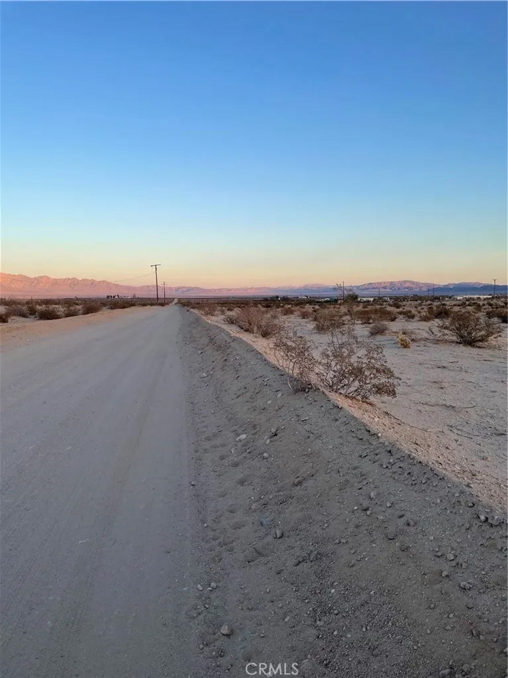 Photo of 78201 Two Mile Rd, 29 Palms, CA 92277 (MLS # JT26088476)