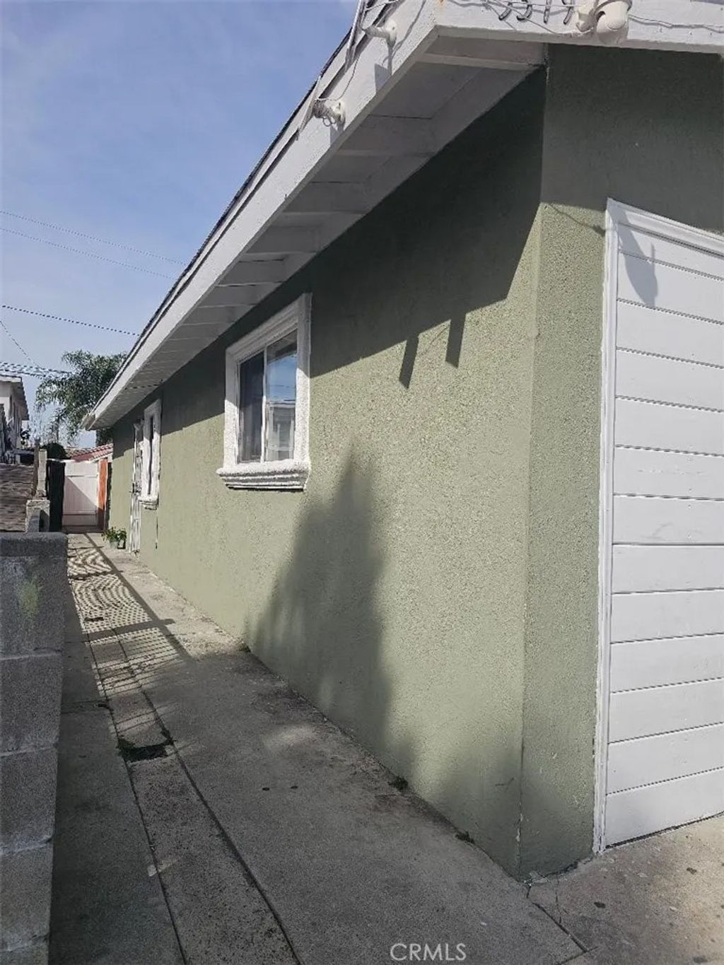 Photo of 5381 Olive Ave, Long Beach, CA 90805 (MLS # PW26043142)