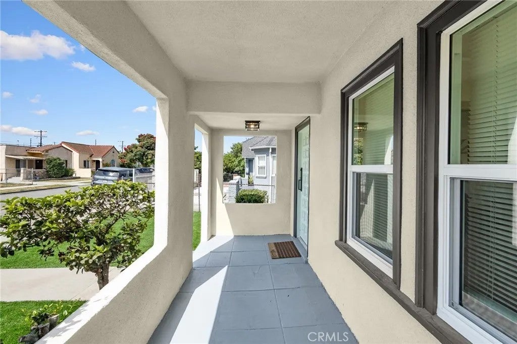 Photo of 1707 W 65th Place, Los Angeles, CA 90047 (MLS # DW26174654)