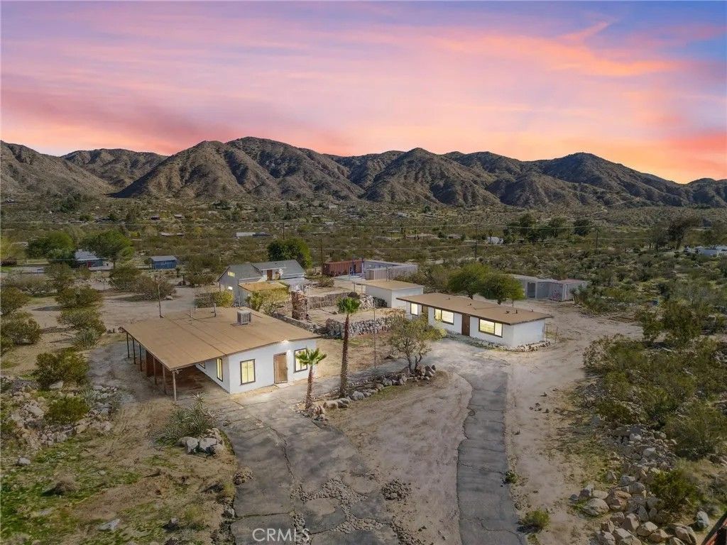 Photo of 9016 Rose Eden Drive, Morongo Valley, CA 92256 (MLS # IV25273070)