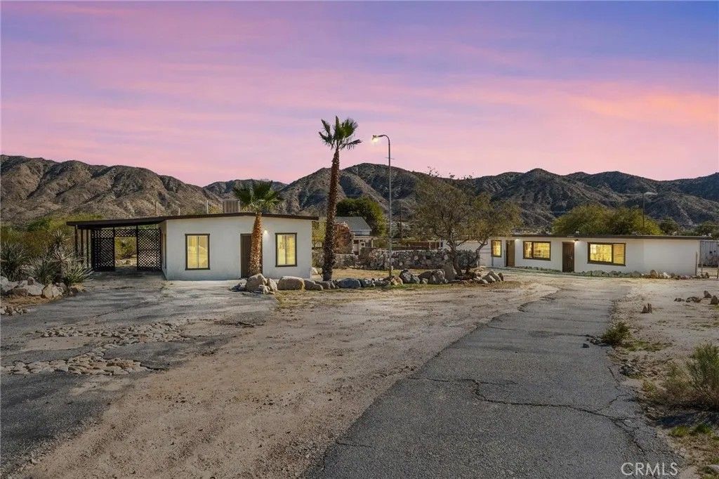 Photo of 9016 Rose Eden Drive, Morongo Valley, CA 92256 (MLS # IV25273070)