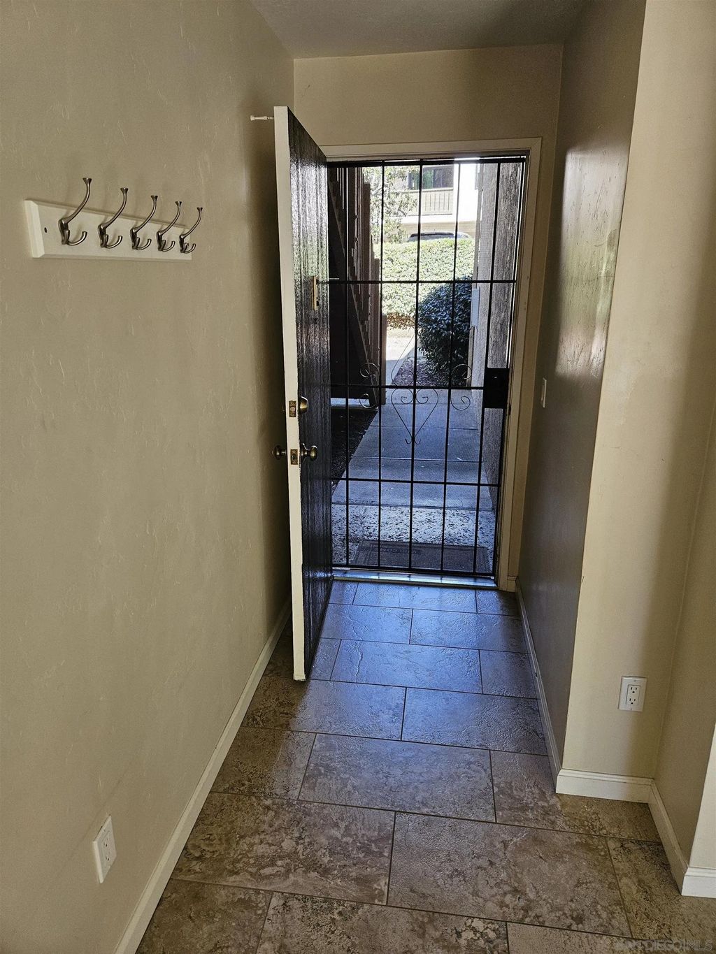Photo of 10333 Caminito Aralia #65, San Diego, CA 92131 (MLS # 260004889)