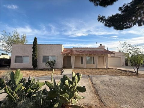 Photo of 21011 Teton Rd, Apple Valley, CA 92308 (MLS # HD26069612)