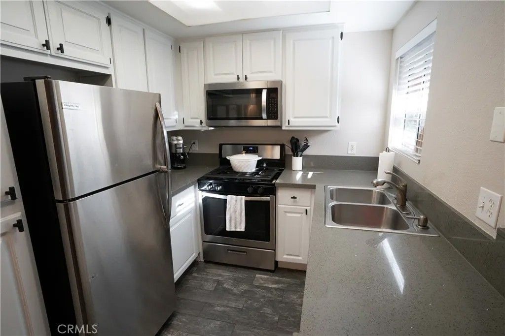 Photo of 16377 Lakeshore Dr #1A, Lake Elsinore, CA 92530 (MLS # SW26012246)