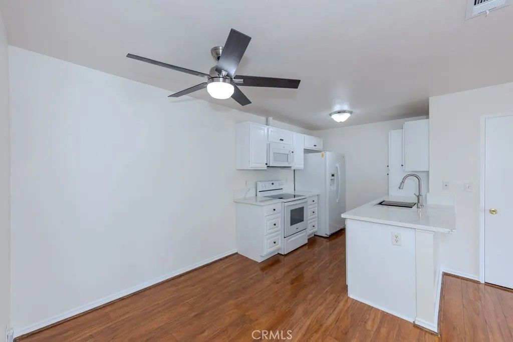 Photo of 23222 Orange Ave #4, Lake Forest, CA 92630 (MLS # PW26077701)