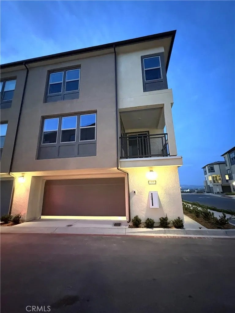 Photo of 315 Honeysuckle Way, Oceanside, CA 92057 (MLS # SW26182508)