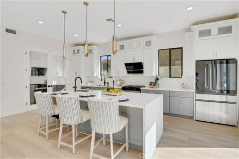Photo of 7156 Mooney Dr, Rosemead, CA 91770 (MLS # TR26143044)