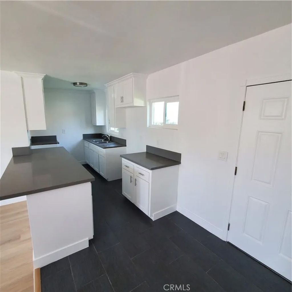Photo of 246 E 87th Place, Los Angeles, CA 90003 (MLS # DW26094358)