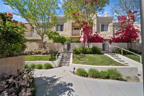 Photo of 25725 Perlman Pl #127, Stevenson Ranch, CA 91381 (MLS # SR26050960)