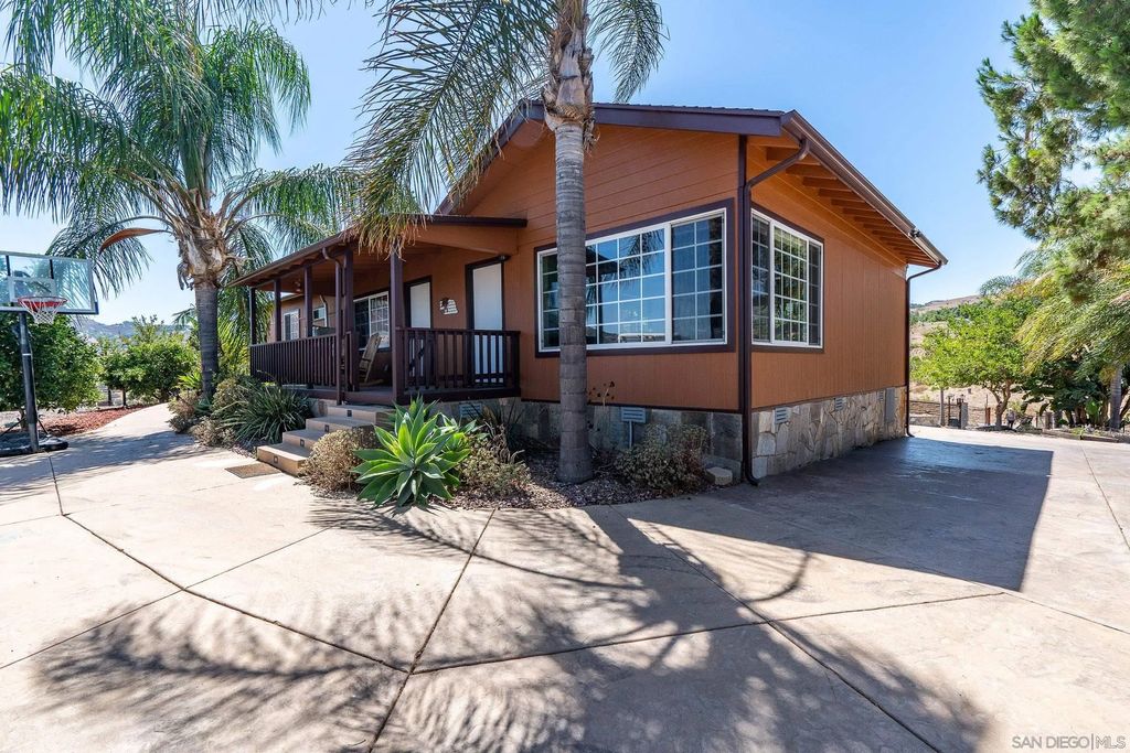 Photo of 9111 Sierra Alta Way, El Cajon, CA 92021 (MLS # 260010347)